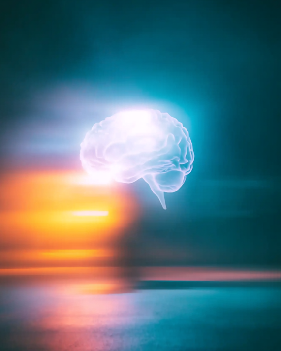 Digital illustration of a glowing brain with a blurred background representing brain benefits of methylene blue